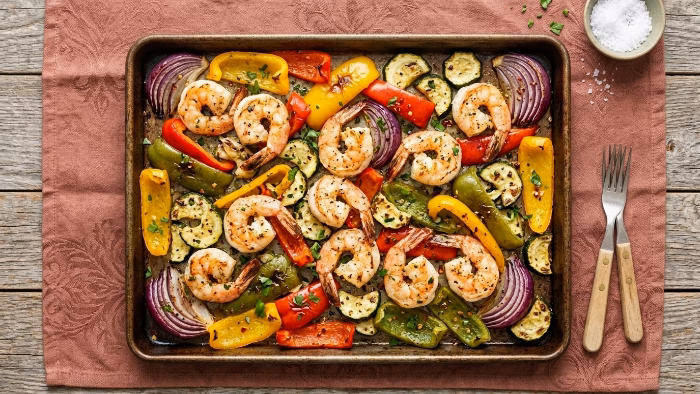 Sheet pan shrimp fajitas with colorful bell peppers roasted to perfection